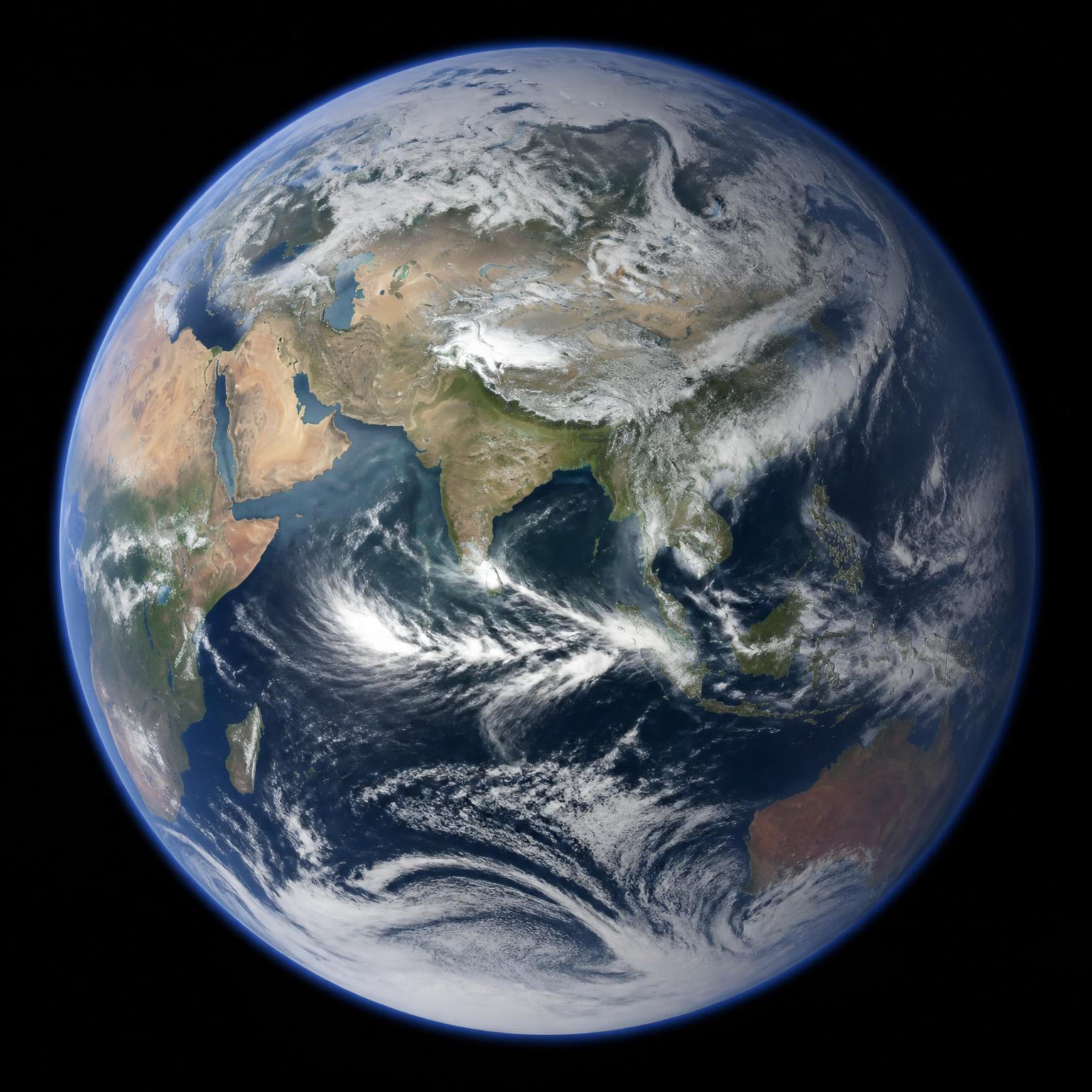 Earth with sun flare, rotating